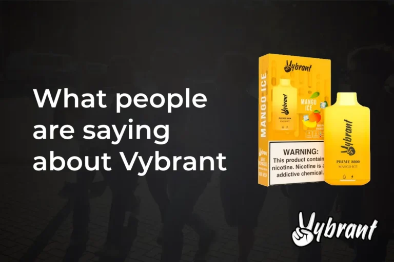 Yellow disposable vape device and box with mango ice flavor and nicotine warning label on dark background.